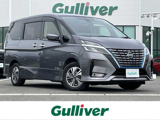 日産 セレナ e－パワー ハイウェイスター V 佐賀県 2022(令4)年 1.9万km ダークメタルグレー 純正10インチナビゲーション/AM/FM/CD/DVD/Bluetooth/フルセグテレビ/純正フリップダウンモニター/アラウンドビューモニター/インテリジェントルームミラー/純正ドライブレコーダー/ETC/両側パワースライドドア/電子パーキングブレーキ/・オートブレーキホールド/LEDヘッドライト/・オートマチックハイビーム/純正15インチアルミホイール/純正フロアマット/プロパイロット/革巻きステアリング/・ステアリングリモコン/ロールサンシェード/スマートキー/・プッシュスタート/スペアキー１本
