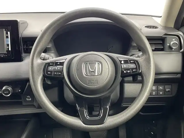 ホンダ ヴェゼル ハイブリッド e:HEV X 新潟県 2021(令3)年 4.2万km サンドカーキパール 4WD/純正メモリナビ【VXM-152VFi】/　フルセグTV/Bluetooth/CD/DVD/USB/ホンダセンシング/・衝突被害軽減ブレーキ/・踏み間違え衝突軽減システム/・急アクセル抑制機能/・歩行者事故低減ステアリング/・路外逸脱抑制機能/・レーダークルーズコントロール/・車線維持支援システム(LKAS)/・トラフィックジャムアシスト(渋滞運転支援機能)/・先行車発進お知らせ機能/・標識認識機能/・オートハイビーム/・パーキングセンサーシステム/前後コーナーセンサー/前席シートヒーター/バックモニター/ヒルディセントコントロール/LEDヘッドライト/パドルシフト