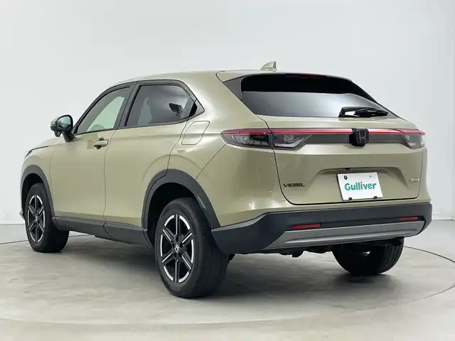 ホンダ ヴェゼル ハイブリッド e:HEV X 新潟県 2021(令3)年 4.2万km サンドカーキパール 4WD/純正メモリナビ【VXM-152VFi】/　フルセグTV/Bluetooth/CD/DVD/USB/ホンダセンシング/・衝突被害軽減ブレーキ/・踏み間違え衝突軽減システム/・急アクセル抑制機能/・歩行者事故低減ステアリング/・路外逸脱抑制機能/・レーダークルーズコントロール/・車線維持支援システム(LKAS)/・トラフィックジャムアシスト(渋滞運転支援機能)/・先行車発進お知らせ機能/・標識認識機能/・オートハイビーム/・パーキングセンサーシステム/前後コーナーセンサー/前席シートヒーター/バックモニター/ヒルディセントコントロール/LEDヘッドライト/パドルシフト