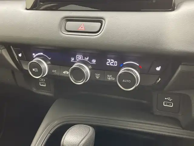 ホンダ ヴェゼル ハイブリッド e:HEV X 新潟県 2021(令3)年 4.2万km サンドカーキパール 4WD/純正メモリナビ【VXM-152VFi】/　フルセグTV/Bluetooth/CD/DVD/USB/ホンダセンシング/・衝突被害軽減ブレーキ/・踏み間違え衝突軽減システム/・急アクセル抑制機能/・歩行者事故低減ステアリング/・路外逸脱抑制機能/・レーダークルーズコントロール/・車線維持支援システム(LKAS)/・トラフィックジャムアシスト(渋滞運転支援機能)/・先行車発進お知らせ機能/・標識認識機能/・オートハイビーム/・パーキングセンサーシステム/前後コーナーセンサー/前席シートヒーター/バックモニター/ヒルディセントコントロール/LEDヘッドライト/パドルシフト