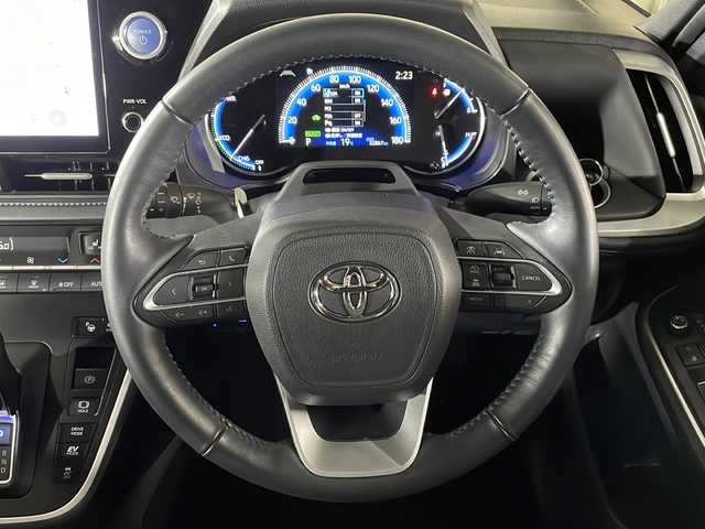 トヨタ ヴォクシー ハイブリッド S－Z 広島県 2022(令4)年 3.3万km ホワイトパールクリスタルシャイン 純正１０．５型ＤＡ/全周囲カメラ/パーキングアシスト/純正14型フリップダウンモニター/両側パワースライドドア/レーダークルーズコントロール/シートヒーター/ドラレコ/ＥＴＣ２．０/ブラインドスポットモニター/衝突軽減/レーンキープ/踏み間違い防止/オートマチックハイビーム/1500W給電/純正17インチアルミホイール(205/55/R17)/エアバッグ(運転席/助手席/サイド/カーテン)