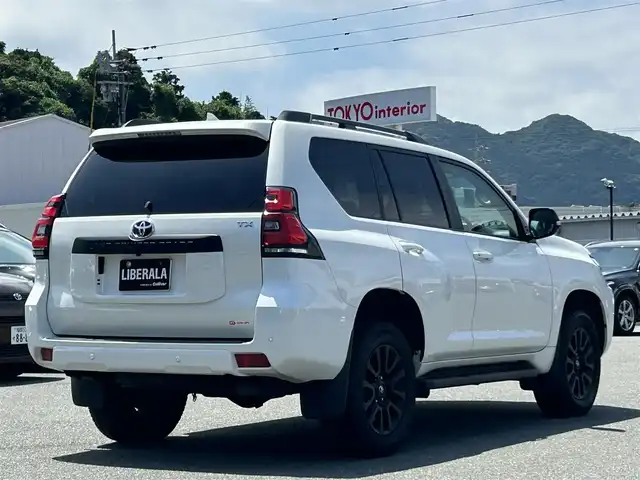 トヨタ ランドクルーザー プラド TX Lパッケージ マットブラED 福岡県 2023(令5)年 2.7万km ホワイトパールクリスタルシャイン １オーナー/７人/サンルーフ/純正ナビ/全方位カメラ/ルーフレール/レザーシート/前席パワーシート/シートヒーター/エアーシート/ＥＴＣ２．０/ＭＴモード/ＢＳＭ/ＵＳＢ/取説/保証書