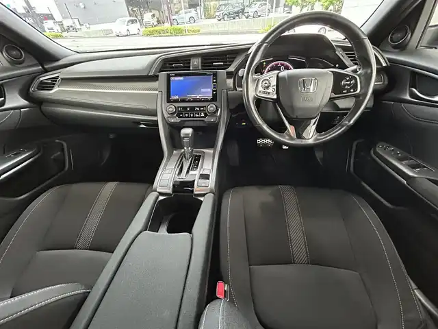 ホンダ シビック ハッチバック 長崎県 2019(平31)年 6.7万km ホワイトオーキッドパール 取説/保証書/ナビ説明書/スペアキー/Gathersナビ　VXM-194VFi/フルセグ/CD、DVD/iPod/AM、FM/BTオーディオ/バックカメラ/アダプティブクルーズコントロール/ステアリングリモコン/パドルシフト/オートライト/プッシュスタート/ビルトインETC/衝突軽減システム/路外逸脱防止システム/電格ウィンカーミラー/DN席オートパワーウィンドウ/DN席シートヒーター/電動パーキング/オートブレーキホールド/社外ドラレコ/ドアバイザー/アイドリングストップオフスイッチ/VTECTURBO/スペアキー