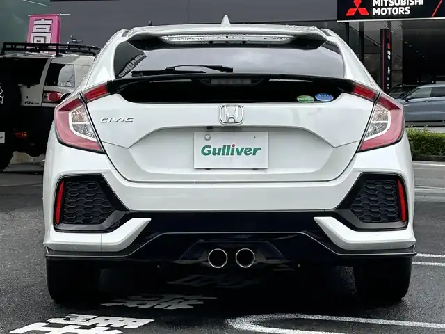 ホンダ シビック ハッチバック 長崎県 2019(平31)年 6.7万km ホワイトオーキッドパール 取説/保証書/ナビ説明書/スペアキー/Gathersナビ　VXM-194VFi/フルセグ/CD、DVD/iPod/AM、FM/BTオーディオ/バックカメラ/アダプティブクルーズコントロール/ステアリングリモコン/パドルシフト/オートライト/プッシュスタート/ビルトインETC/衝突軽減システム/路外逸脱防止システム/電格ウィンカーミラー/DN席オートパワーウィンドウ/DN席シートヒーター/電動パーキング/オートブレーキホールド/社外ドラレコ/ドアバイザー/アイドリングストップオフスイッチ/VTECTURBO/スペアキー