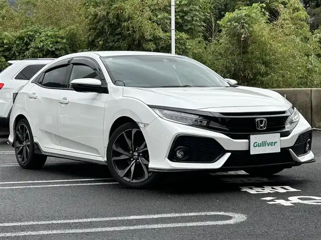 ホンダ シビック ハッチバック 長崎県 2019(平31)年 6.7万km ホワイトオーキッドパール 取説/保証書/ナビ説明書/スペアキー/Gathersナビ　VXM-194VFi/フルセグ/CD、DVD/iPod/AM、FM/BTオーディオ/バックカメラ/アダプティブクルーズコントロール/ステアリングリモコン/パドルシフト/オートライト/プッシュスタート/ビルトインETC/衝突軽減システム/路外逸脱防止システム/電格ウィンカーミラー/DN席オートパワーウィンドウ/DN席シートヒーター/電動パーキング/オートブレーキホールド/社外ドラレコ/ドアバイザー/アイドリングストップオフスイッチ/VTECTURBO/スペアキー