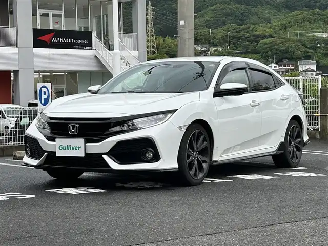 ホンダ シビック ハッチバック 長崎県 2019(平31)年 6.7万km ホワイトオーキッドパール 取説/保証書/ナビ説明書/スペアキー/Gathersナビ　VXM-194VFi/フルセグ/CD、DVD/iPod/AM、FM/BTオーディオ/バックカメラ/アダプティブクルーズコントロール/ステアリングリモコン/パドルシフト/オートライト/プッシュスタート/ビルトインETC/衝突軽減システム/路外逸脱防止システム/電格ウィンカーミラー/DN席オートパワーウィンドウ/DN席シートヒーター/電動パーキング/オートブレーキホールド/社外ドラレコ/ドアバイザー/アイドリングストップオフスイッチ/VTECTURBO/スペアキー