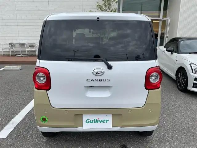 ダイハツ ムーヴ キャンバス ストライプス G 石川県 2022(令4)年 2万km シャイニングホワイトパール/サンドベージュメタリック 社外メモリーナビ/フルセグTV/バックカメラ/両側パワースライドドア/LEDヘッドライト/ドライブレコーダー/スマートアシスト/コーナーセンサー/シートヒーター/スマートキー/プッシュスタート/電動ミラー/ベンチシート/保証書