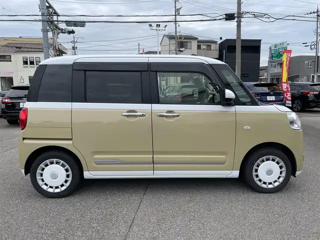 ダイハツ ムーヴ キャンバス ストライプス G 石川県 2022(令4)年 2万km シャイニングホワイトパール/サンドベージュメタリック 社外メモリーナビ/フルセグTV/バックカメラ/両側パワースライドドア/LEDヘッドライト/ドライブレコーダー/スマートアシスト/コーナーセンサー/シートヒーター/スマートキー/プッシュスタート/電動ミラー/ベンチシート/保証書