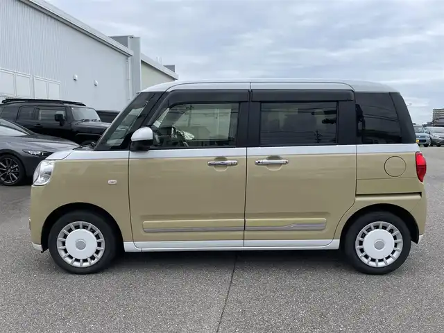 ダイハツ ムーヴ キャンバス ストライプス G 石川県 2022(令4)年 2万km シャイニングホワイトパール/サンドベージュメタリック 社外メモリーナビ/フルセグTV/バックカメラ/両側パワースライドドア/LEDヘッドライト/ドライブレコーダー/スマートアシスト/コーナーセンサー/シートヒーター/スマートキー/プッシュスタート/電動ミラー/ベンチシート/保証書