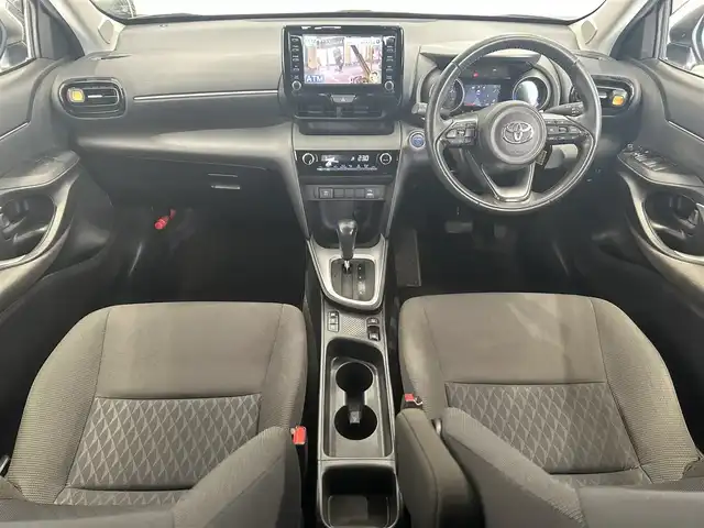 トヨタ ヤリスクロス ハイブリッド G 岐阜県 2021(令3)年 1.5万km ホワイトパールクリスタルシャイン ブラインドスポットモニター　/メーカー純正ナビ（フルセグ・Ｂｌｕｅｔｏｏｔｈ・ＵＳＢ）　/トヨタセーフティセンス　/オートクルーズコントロール　/ドライブレコーダー　/ＬＥＤヘッドライト　/純正フロアマット/取扱説明書/ナビ取扱説明書/純正16インチアルミホイール/純正ドアバイザー/前後コーナーセンサー