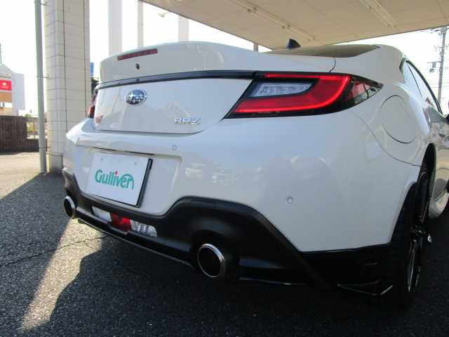 スバル ＢＲＺ STIスポーツ 岡山県 2024(令6)年 0.6万km クリスタルホワイトP 【 EyeSight 】/・プリクラッシュブレーキ/・後退時ブレーキアシスト/・クリアランスソナー/・AT誤発進抑制制御/・AT誤後進抑制機能/・全車速追従機能付クルーズコントロール/・定速クルーズコントロール/・ふらつき警報/・車線逸脱警報/・先行車発進お知らせ/・ステアリング連動ヘッドランプ/・後側方警戒支援システム/・ハイビームアシスト/STIアンダーエアロ（フロント・サイド・リアアンダー）/ワンオーナー/純正9インチSDナビ/フルセグテレビ/バックカメラ/Bluetooth/DVD再生可能/純正ドライブレコーダー/ハーフレザーシート/シートヒーター（前席）/オートライト/ミラーヒーター/LEDヘッドライト/ETC/純正18AW/純正フロアマット/取扱説明書・保証書