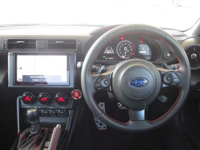 スバル ＢＲＺ STIスポーツ 岡山県 2024(令6)年 0.6万km クリスタルホワイトP 【 EyeSight 】/・プリクラッシュブレーキ/・後退時ブレーキアシスト/・クリアランスソナー/・AT誤発進抑制制御/・AT誤後進抑制機能/・全車速追従機能付クルーズコントロール/・定速クルーズコントロール/・ふらつき警報/・車線逸脱警報/・先行車発進お知らせ/・ステアリング連動ヘッドランプ/・後側方警戒支援システム/・ハイビームアシスト/STIアンダーエアロ（フロント・サイド・リアアンダー）/ワンオーナー/純正9インチSDナビ/フルセグテレビ/バックカメラ/Bluetooth/DVD再生可能/純正ドライブレコーダー/ハーフレザーシート/シートヒーター（前席）/オートライト/ミラーヒーター/LEDヘッドライト/ETC/純正18AW/純正フロアマット/取扱説明書・保証書