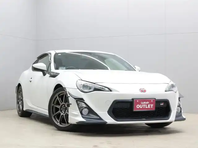 トヨタ ８６ GT 三重県 2014(平26)年 5.8万km クリスタルホワイトパール KENWOODメモリナビ・地デジTV/・DVD/CD/・Bluetooth/バックカメラ/コムテック前後ドライブレコーダー/コムテックGPSレーダー探知機/ETC/RAYS gram LIGHTS18インチアルミホイール/TRDハイレスポンスマフラーVer.R/TRDフロントスポイラー/TRDサイドスカート/TRDマフラーガーニッシュ/TRDリアトランクスポイラー/TRDエアロタービュレーター/TRDリヤウインドゥルーバー/TEIN車高調整式ダンパー/BLITZカーボンエアクリーナー/BLITZタワーバー/社外LEDテールライト/プッシュエンジンスタート/スマートキー/新車時保証書/取扱説明書