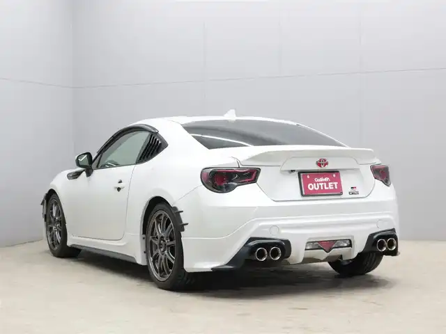 トヨタ ８６ GT 三重県 2014(平26)年 5.8万km クリスタルホワイトパール KENWOODメモリナビ・地デジTV/・DVD/CD/・Bluetooth/バックカメラ/コムテック前後ドライブレコーダー/コムテックGPSレーダー探知機/ETC/RAYS gram LIGHTS18インチアルミホイール/TRDハイレスポンスマフラーVer.R/TRDフロントスポイラー/TRDサイドスカート/TRDマフラーガーニッシュ/TRDリアトランクスポイラー/TRDエアロタービュレーター/TRDリヤウインドゥルーバー/TEIN車高調整式ダンパー/BLITZカーボンエアクリーナー/BLITZタワーバー/社外LEDテールライト/プッシュエンジンスタート/スマートキー/新車時保証書/取扱説明書