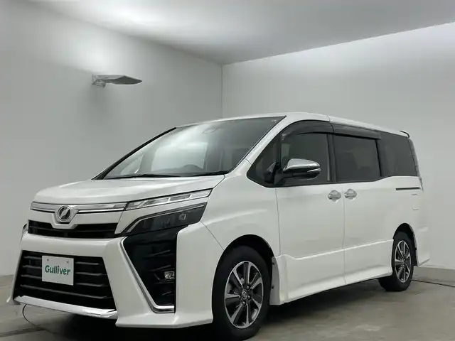 トヨタ ヴォクシー ZS 煌Ⅱ 岡山県 2019(平31)年 5.7万km ホワイトパールクリスタルシャイン 社外SDナビ/（CD/DVD/BT)/両側パワースライドドア/LEDヘッドライト/オートライト/クルーズコントロール/ETC/USB/フロアマット/純正16インチアルミ