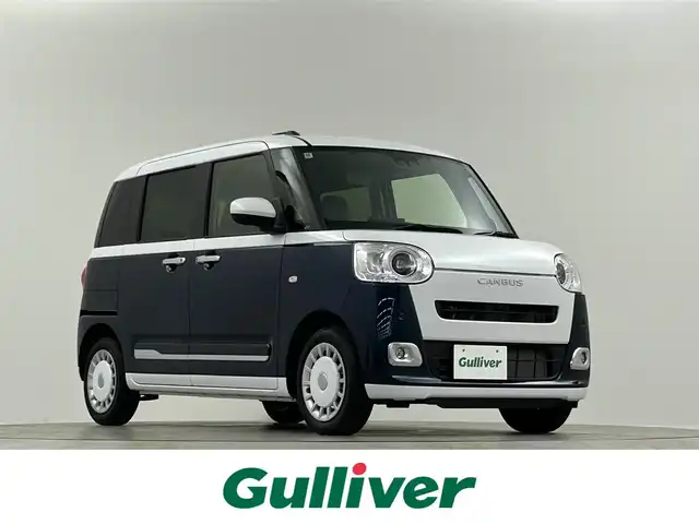 ダイハツ ムーヴ キャンバス ストライプス G ターボ 埼玉県 2024(令6)年 0.6万km シャイニングホワイトパール/レーザーブルークリスタルシャイン 純正９インチディスプレイオーディオ　Ｂｌｕｅｔｏｏｔｈ　全方位カメラ　両側電動スライドドア　シートヒーター　ＥＴＣ　ドラレコ　ウェルカムオープン機能　追従走行　スマートアシスト　置くだけ充電　ＬＥＤ