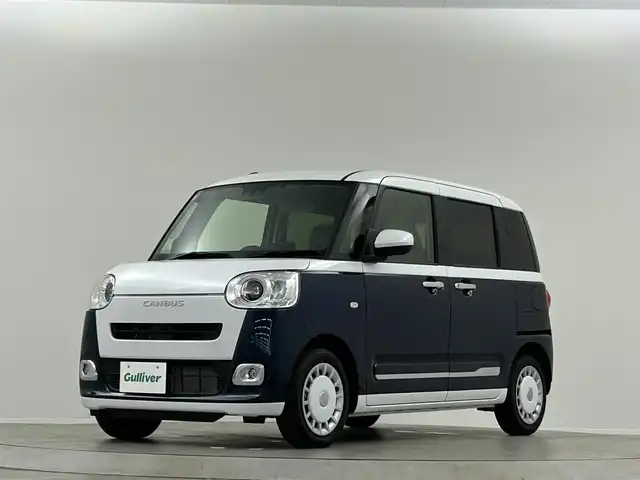 ダイハツ ムーヴ キャンバス ストライプス G ターボ 埼玉県 2024(令6)年 0.6万km シャイニングホワイトパール/レーザーブルークリスタルシャイン 純正９インチディスプレイオーディオ　Ｂｌｕｅｔｏｏｔｈ　全方位カメラ　両側電動スライドドア　シートヒーター　ＥＴＣ　ドラレコ　ウェルカムオープン機能　追従走行　スマートアシスト　置くだけ充電　ＬＥＤ