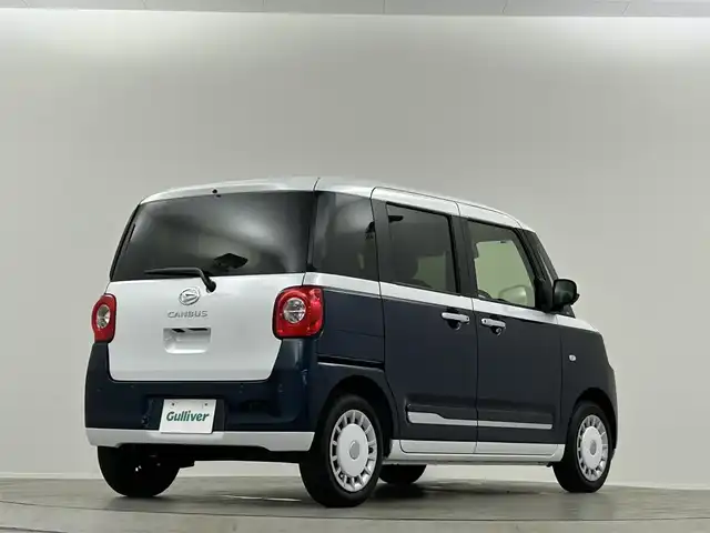 ダイハツ ムーヴ キャンバス ストライプス G ターボ 埼玉県 2024(令6)年 0.6万km シャイニングホワイトパール/レーザーブルークリスタルシャイン 純正９インチディスプレイオーディオ　Ｂｌｕｅｔｏｏｔｈ　全方位カメラ　両側電動スライドドア　シートヒーター　ＥＴＣ　ドラレコ　ウェルカムオープン機能　追従走行　スマートアシスト　置くだけ充電　ＬＥＤ