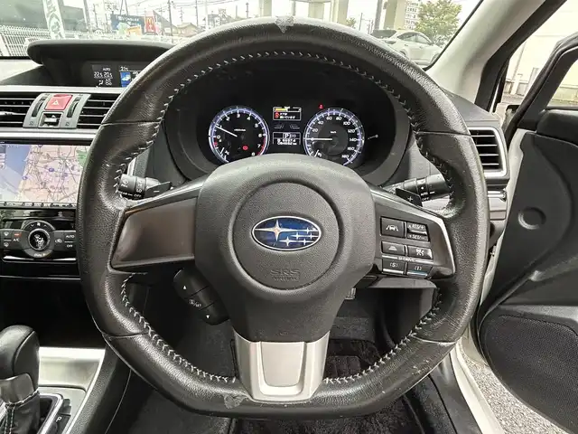 スバル レヴォーグ 1．6GT アイサイト 三重県 2014(平26)年 8.5万km クリスタルホワイトP 登録時84682km/禁煙車/純正ナビ【CN-R300D】/（AM/FM/TV/Bluetooth/HDMI）/フルセグTV/バックカメラ/ETC/レーダークルーズコントロール/ステアリングスイッチ/パドルシフト/アイドリングストップ/アイサイト/衝突軽減システム/レーンキープアシスト/オートライト/純正アルミ/プッシュスタート/スペアキー