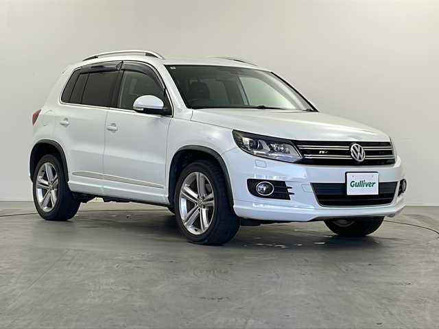 フォルクスワーゲン ティグアン TSI BMテクノ Rライン 栃木県 2015(平27)年 6.9万km 白 純正ナビ/（BT/フルセグ/CD/DVD/AM/FM）/横滑り防止/アイドリングストップ/ETC/バックカメラ/MTモード付AT/純正アルミホイール/純正フロアマット