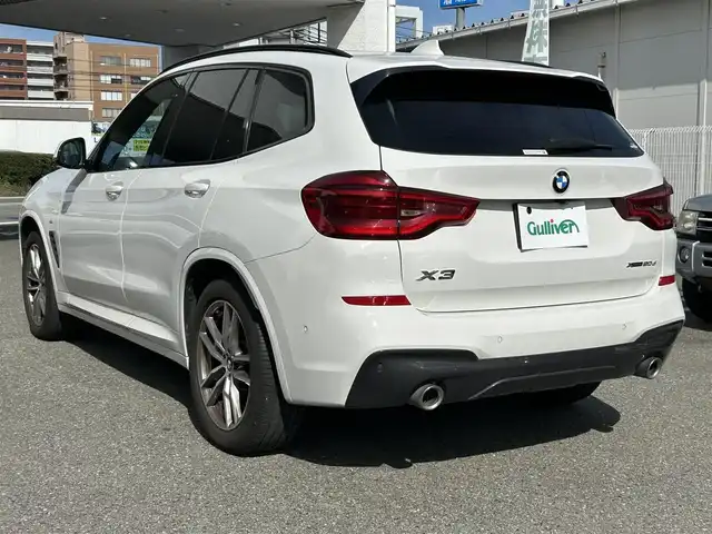 ＢＭＷ Ｘ３ 20d xDrive Mスポーツ 福岡県 2018(平30)年 5.9万km アルピンホワイトⅢ 純正メーカーナビ（AM/FM/BT/CD/DVD/フルセグTV）/ドライビング・アシスト・プロフェッショナル/ブラインドスポットモニター/サンルーフ/バックカメラ/ヘッドアップディスプレイ/Harman/Kardonサウンド/全席シートヒーター/前席パワーシート（運転席メモリ付）/前席エアシート/アクティブクルーズコントロール/ドライブレコーダー/ETC/携帯置くだけ充電/パドルシフト/電動リアゲート/パーク・ディスタンス・コントロール/ルーフレール/フロアマット/純正19インチアルミホイール/スペアキー/取扱説明書/保証書