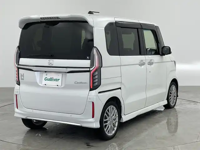 ホンダ Ｎ ＢＯＸ カスタム L ターボ 愛知県 2022(令4)年 3.2万km プラチナホワイトパール 純正ナビ/・CD/DVD/・FM/AM/・フルセグTV/・SD/・Music Rack/・USB/・iPod/・Bluetooth/主要装備/・バックカメラ/・レーダークルーズコントロール/・ホンダセンシング/(衝突被害軽減システム)/・両側パワースライドドア/・シートヒーター/・ＬＥＤヘッドライト/・サイドカーテンエアバッグ/・ハーフレザーシート/・電動パーキング/・フォグランプ/・コーナーセンサー/・横滑り防止装置