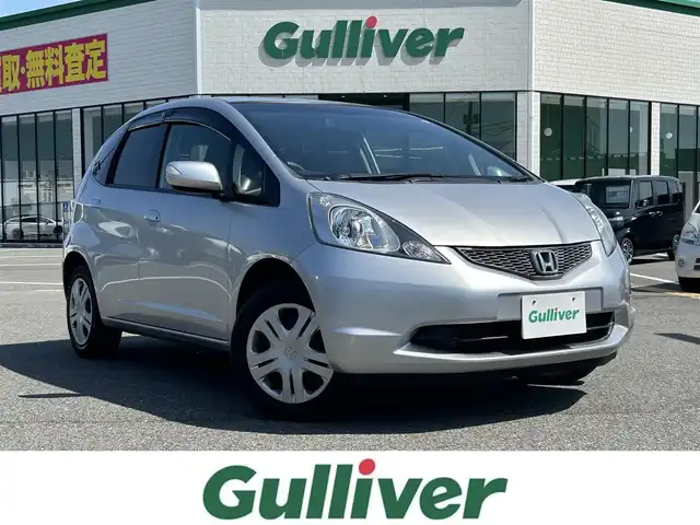 ホンダ フィット L 鳥取県 2010(平22)年 2.8万km アラバスターシルバーメタリック ４・W・D/ワンオーナー/社外ナビ/フルセグ/DVD/CD/バックカメラ/ビルトインETC/キセノンライト/スマートキー/フロアマット/ドアバイザー/スペアキー/スタッドレスアルミセット積込/(タイヤ溝5部山)