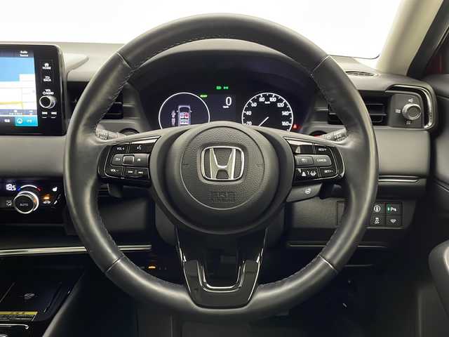 ホンダ ヴェゼル ハイブリッド e:HEV Z 宮崎県 2021(令3)年 2.7万km プレミアムクリスタルレッドM 禁煙車/ホンダセンシング/純正9型ディスプレイオーディオナビTV/（HONDA CONNECT/Bluetooth/HDMI/USB/フルセグTV)/純正バックカメラ/純正ビルトイン2.0ETC/純正LEDオートライト/純正LEDフォグ/純正18インチアルミ/純正フロアマット/アダプティブクルーズコントロール/レーンディパーチャーアラート/ブラインドスポットモニター/クリアランスソナー/ダウンヒルアシストコントロール/電子パーキング/ブレーキホールド/パドルシフト/本革巻ハンドル/置くだけ充電/パワーバックドア/ハーフレザーシート/デュアルオートエアコン/スマートキー/プッシュエンジンスタート/新車時保証書/取扱い説明書