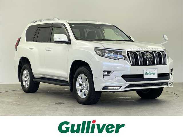 トヨタ ランドクルーザー プラド TX Lパッケージ 千葉県 2019(令1)年 7.6万km ホワイトパールクリスタルシャイン 4WD/サンルーフ/TRDエアロ/トヨタセーフティセンス/・プリクラッシュセーフティ/・レーンディパーチャーアラート/・オートハイビーム/社外9インチメモリナビ/CD DVD BT HDMI フルセグ/バックカメラ/アダプティブクルーズコントロール/LEDオートライト/ブラックレザーシート/前席パワーシート/前席シートエアコン/純正17インチアルミホイール/革巻きステアリング/ステアリングスイッチ/ドアバイザー/スマートキー/プッシュスタート/ビルトインETC