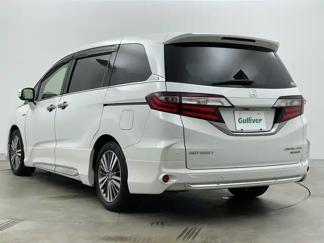 ホンダ オデッセイ ハイブリッド アブソルート・EXホンダセンジング 岡山県 2019(平31)年 5.7万km プラチナホワイトパール 無限エアロ(フロント・サイド・リアアンダー)/無限ドアバイザー/純正11.6インチ後席モニター/(VM185EN)/両側電動スライド/純正9インチナビ(VXM-197VFNi)/(Bluetooth/CD/USB/フルセグTV/Carplay/HDMI)/全方位カメラ/100V電源/ハーフレザー/シートヒーター(運転席・助手席)/パワーシート(運転席・助手席)/純正LEDヘッドライト/コーナーセンサー(前後)/純正ドラレコ(前)/ビルトインETC2.0/レーダークルーズコントロール/オートライト/純正フロアマット/純正17インチアルミ