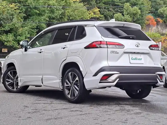 トヨタ カローラ クロス Z 大阪府 2022(令4)年 2.1万km プラチナホワイトパールマイカ /禁煙車//ワンオーナー車//9インチナビ機能付きディスプレイオーディオ/・FM・AM・BT・USB・Miracast・フルセグTV//モデリスタエアロ(F.S.R)//ハーフレザーシート//前席シートヒーター//パワーバックドア//ルーフレール//レーダークルーズコントロール//BSM(ブラインドスポットモニター)//LTA(レーントレーシングアシスト)//RSA(ロードサインアシスト)//LEDヘッドライト//オートマチックハイビーム//プロジェクションカーテシイルミ//ビルトインETC2.0//ディーラーOP前後ドラレコ・レーダー//電動パーキングブレーキ//保証書//取扱説明書//スペアキー