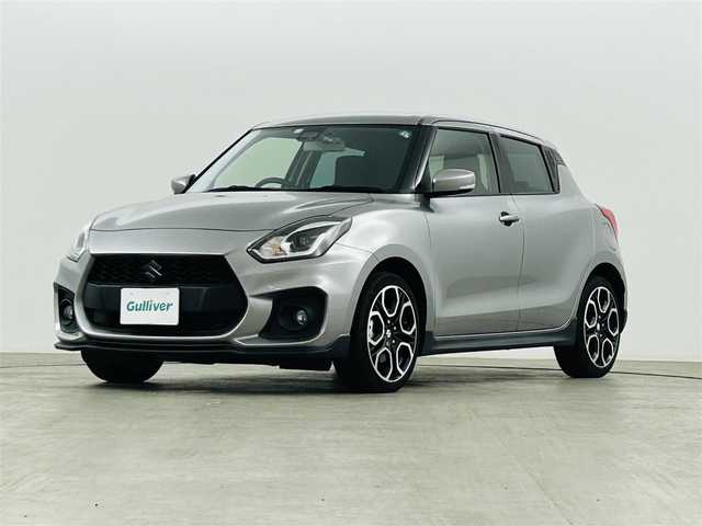 スズキ スイフト スポーツ 福島県 2023(令5)年 2.8万km プレミアムシルバーメタリック 社外ディスプレイオーディオ/【AM/FM/Bluetooth/AUX/ipod】/・バックカメラ/・社外前方ドライブレコーダー/・社外ETC/スズキセーフティサポート/・衝突軽減ブレーキ/・車線逸脱警報装置/・レーダークルーズコントロール/・レーンキープアシスト/コーナーセンサー/運転席シートヒーター/革巻きステアリング/・ステアリングスイッチ/LEDヘッドライト/・オートライト/・フロントフォグライト/・リアフォグライト/電動格納ウィンカーミラー/純正フロアマット/横滑り防止装置