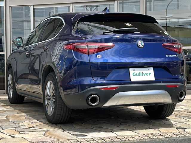 アルファロメオ ステルヴィオ ファーストエディション 静岡県 2019(令1)年 7.5万km ブルーモンテカルロ 純正メモリナビ/・Bluetooth/・USB/・AUX/・AM/・FM/主要装備/・衝突軽減/・追従クルコン/・バックカメラ/・コーナーセンサー/・ETC/・オートライト/・オートハイビーム/・純正ドラレコ前後/・シートヒーター/・ハンドルヒーター/・フォグランプ/・純正アルミホイール/・純正フロアマット/・スマートキー/・プッシュスタート