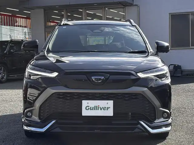 トヨタ カローラ クロス ハイブリッド Z 熊本県 2024(令6)年 3万km スパークリングブラックパールクリスタルシャイン ワンオーナー/モデリスタエアロ/純正ナビ付ディスプレイオーディオ/【フルセグTV/Bluetooth】/パノラミックビューモニター/トヨタセーフティーセンス/・レーダークルーズコントロール/・プリクラッシュセーフティ/・レーントレーシングアシスト/・レーンディパーチャーアラート/・プロアクティブドライビングアシスト/・ブラインドスポットモニター/・リヤクロストラフィックアラート/・リヤカメラディテクション/・パーキングサポートブレーキ/・ロードサインアシスト/・発進遅れ告知機能/・ドライバー異常時対応システム/・ロードサインアシスト/ブレーキホールド/パワーバックドア/純正18インチAW/オートLEDライト/オートマチックハイビーム/ウィンカーミラー/ハーフレザーシート/D席パワーシート/前席シートヒーター/革巻きステアリング/ステアリングスイッチ/ETC/ドライブレコーダー前後/フロアマット/純正ドアバイザー/保証書/取扱説明書/スペアキー