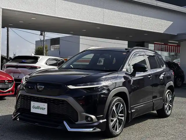トヨタ カローラ クロス ハイブリッド Z 熊本県 2024(令6)年 3万km スパークリングブラックパールクリスタルシャイン ワンオーナー/モデリスタエアロ/純正ナビ付ディスプレイオーディオ/【フルセグTV/Bluetooth】/パノラミックビューモニター/トヨタセーフティーセンス/・レーダークルーズコントロール/・プリクラッシュセーフティ/・レーントレーシングアシスト/・レーンディパーチャーアラート/・プロアクティブドライビングアシスト/・ブラインドスポットモニター/・リヤクロストラフィックアラート/・リヤカメラディテクション/・パーキングサポートブレーキ/・ロードサインアシスト/・発進遅れ告知機能/・ドライバー異常時対応システム/・ロードサインアシスト/ブレーキホールド/パワーバックドア/純正18インチAW/オートLEDライト/オートマチックハイビーム/ウィンカーミラー/ハーフレザーシート/D席パワーシート/前席シートヒーター/革巻きステアリング/ステアリングスイッチ/ETC/ドライブレコーダー前後/フロアマット/純正ドアバイザー/保証書/取扱説明書/スペアキー