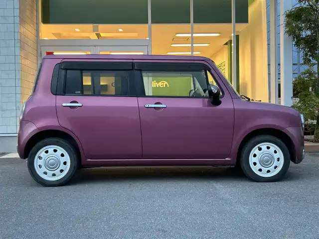 スズキ ラパン ショコラ X 香川県 2014(平26)年 6.9万km カシスピンクパールメタリック 登録時走行距離：68872km/純正ナビゲーション/【地デジ/BT/SD/idod】/衝突被害軽減ブレーキ/バックカメラ/ビルトインETC/アイドリングストップ/HIDヘッドライト/オートライト/横滑り防止装置/誤発進抑制装置/電動格納ミラー/純正フロアマット/ベンチシート/スマートキー/スペアキー