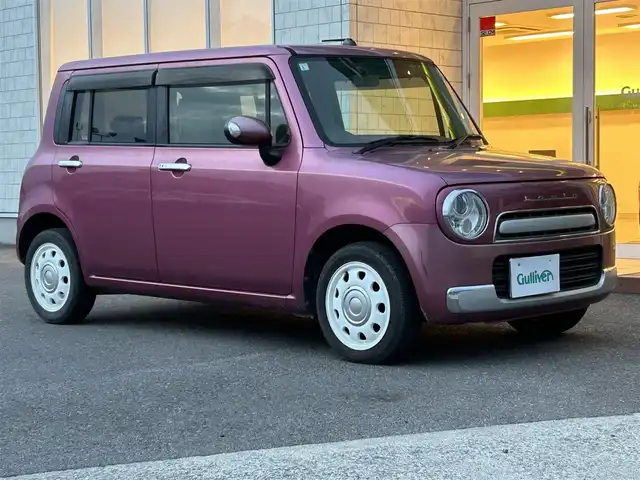 スズキ ラパン ショコラ X 香川県 2014(平26)年 6.9万km カシスピンクパールメタリック 登録時走行距離：68872km/純正ナビゲーション/【地デジ/BT/SD/idod】/衝突被害軽減ブレーキ/バックカメラ/ビルトインETC/アイドリングストップ/HIDヘッドライト/オートライト/横滑り防止装置/誤発進抑制装置/電動格納ミラー/純正フロアマット/ベンチシート/スマートキー/スペアキー