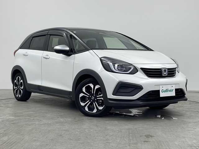 ホンダ フィット e:HEVクロスター 三重県 2020(令2)年 4.8万km プラチナホワイトパール 禁煙車/純正7インチナビ/　フルセグTV/CD/DVD/Bluetooth/バックカメラ/純正LEDヘッドライト/ホンダセンシング/前後ドラレコ/前後コーナーセンサー/プッシュスタート/スマートキー/ステアリングスイッチ/AAC/衝突軽減ブレーキシステム/レーンキープアシストシステム/オートマチックハイビーム/オートライト/スペアキー