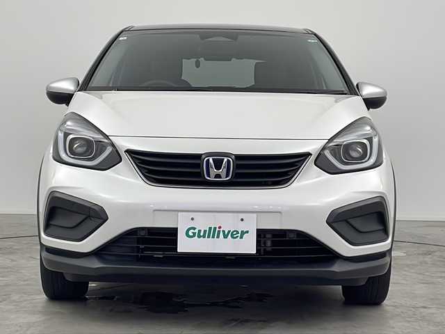 ホンダ フィット e:HEVクロスター 三重県 2020(令2)年 4.8万km プラチナホワイトパール 禁煙車/純正7インチナビ/　フルセグTV/CD/DVD/Bluetooth/バックカメラ/純正LEDヘッドライト/ホンダセンシング/前後ドラレコ/前後コーナーセンサー/プッシュスタート/スマートキー/ステアリングスイッチ/AAC/衝突軽減ブレーキシステム/レーンキープアシストシステム/オートマチックハイビーム/オートライト/スペアキー
