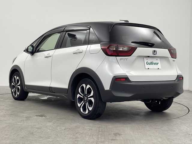 ホンダ フィット e:HEVクロスター 三重県 2020(令2)年 4.8万km プラチナホワイトパール 禁煙車/純正7インチナビ/　フルセグTV/CD/DVD/Bluetooth/バックカメラ/純正LEDヘッドライト/ホンダセンシング/前後ドラレコ/前後コーナーセンサー/プッシュスタート/スマートキー/ステアリングスイッチ/AAC/衝突軽減ブレーキシステム/レーンキープアシストシステム/オートマチックハイビーム/オートライト/スペアキー