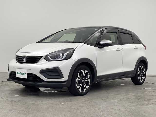 ホンダ フィット e:HEVクロスター 三重県 2020(令2)年 4.8万km プラチナホワイトパール 禁煙車/純正7インチナビ/　フルセグTV/CD/DVD/Bluetooth/バックカメラ/純正LEDヘッドライト/ホンダセンシング/前後ドラレコ/前後コーナーセンサー/プッシュスタート/スマートキー/ステアリングスイッチ/AAC/衝突軽減ブレーキシステム/レーンキープアシストシステム/オートマチックハイビーム/オートライト/スペアキー