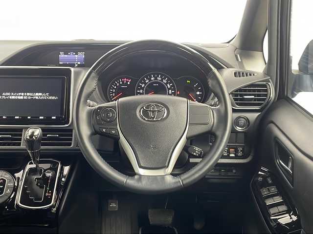 トヨタ ノア Si ダブルバイビーⅢ 栃木県 2021(令3)年 4.4万km ブラック 両側パワースライドドア/純正9インチナビ/純正12.1インチフリップダウンモニター/トヨタセーフティセンス/クルーズコントロール/プリクラッシュセーフティ/コーナーセンサー/レーンディパーチャーアラート/アイドリングストップ/ETC2.0/ドライブレコーダー/オートライト/オートハイビーム/横滑り防止装置/電動格納ミウィンカーミラー/ステアリングスイッチ/純正フロアマット/純正16インチAW