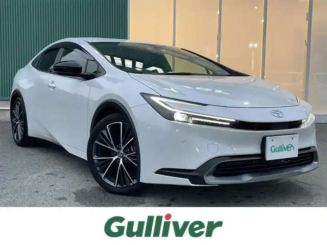 トヨタ プリウス G 福岡県 2023(令5)年 2.2万km プラチナホワイトパールマイカ クルーズコントロール/衝突軽減ブレーキ/前後コーナーセンサー/純正ナビ/Bluetoothオーディオ/フルセグTV/全方位カメラ/ビルトインETC2.0/ハイビームアシスト/LEDヘッドライト/純正フロアマット/純正アルミホイール