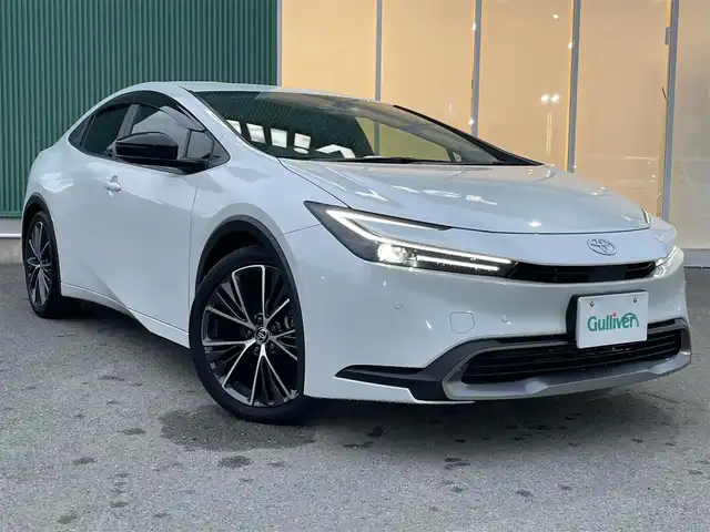 トヨタ プリウス G 福岡県 2023(令5)年 2.2万km プラチナホワイトパールマイカ クルーズコントロール/衝突軽減ブレーキ/前後コーナーセンサー/純正ナビ/Bluetoothオーディオ/フルセグTV/全方位カメラ/ビルトインETC2.0/ハイビームアシスト/LEDヘッドライト/純正フロアマット/純正アルミホイール