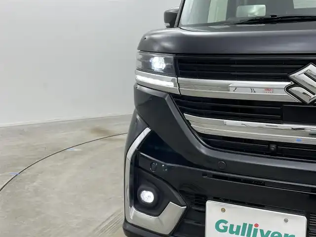 スズキ スペーシア カスタム HYBRID XS 岡山県 2023(令5)年 2.6万km ブルーイッシュブラックパール3 純正9インチディスプレイオーディオ/【ナビ/Bluetooth/フルセグTV/Carplay/USB】/全方位モニター/両側パワースライドドア/純正ドライブレコーダー（前後）/追従型クルーズコントロール/前席シートヒーター/ステアリングヒーター/オートブレーキホールド/衝突軽減ブレーキ/ハーフレザーシート/ヘッドアップディスプレイ/ビルトインETC/LEDヘッドライト/フォグランプ/純正15インチアルミホイール/スマートキー×2