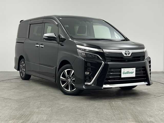 トヨタ ヴォクシー ZS 煌Ⅱ 三重県 2020(令2)年 1.9万km ブラック 禁煙車/純正9インチナビ/CD/DVD/BT/MSV/フルセグTV/バックカメラ/クルーズコントロール/オートハイビーム/プリクラッシュセーフティ/車線逸脱システム/両側パワースライドドア/純正16インチAW/ETC/スマートキー/純正LEDライト/フォグライト