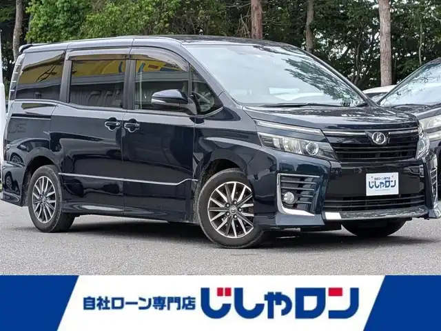 トヨタ ヴォクシー ZS 栃木県 2014(平26)年 12.7万km ブラッキッシュアゲハガラスフレーク (株)IDOMが運営する【じしゃロン宇都宮店】の自社ローン対象車両になります。こちらは現金またはオートローンご利用時の価格です。自社ローンご希望の方は別途その旨お申付け下さい/ALPINE製SDナビ/CD/DVD/BT/TV/ALPINE製フリップダウンモニター/両側パワースライドドア/ETC/バックカメラ/ドライブレコーダー/プッシュスタート/スマートキー/純正16インチAW/ドアミラーウインカー/ドアバイザー