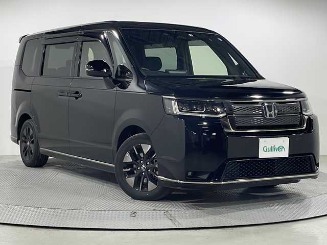ホンダ ステップワゴン スパーダ eHEV 広島県 2022(令4)年 2.8万km クリスタルブラックパール 純正11.4型ナビ/純正15.6型フリップダウンモニター/両側パワースライドドア/バックカメラ/ハーフレザーシート/シートヒーター/パワーテールゲート/オットマン/ホンダセンシング/・衝突軽減ブレーキ/・誤発進抑制機能/・アダプティブクルーズコントロール/・レーンキープアシスト/・オートハイビーム/・パーキングセンサー/・ブラインドスポットインフォメーション/パドルシフト/LEDヘッドランプ/純正16インチAW/USB入力端子/ETC