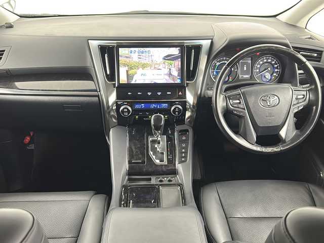 トヨタ ヴェルファイア ハイブリット ZR 埼玉県 2018(平30)年 4.7万km パール 純正10インチナビ/(FM・AM・CD・DVD・SD・BT)/ETC2.0/両側パワースライドドア/レザーシート/オートLEDライト/フルセグテレビ/12型純正フリップダウンモニター/クリアランスソナー/バックカメラ/パワーシート/エアーシート/パワーバックドア/モデリスタエアロ/レーダークルーズコントロール/デジタルミラー/シートポジションメモリー/PCS/車線逸脱警報