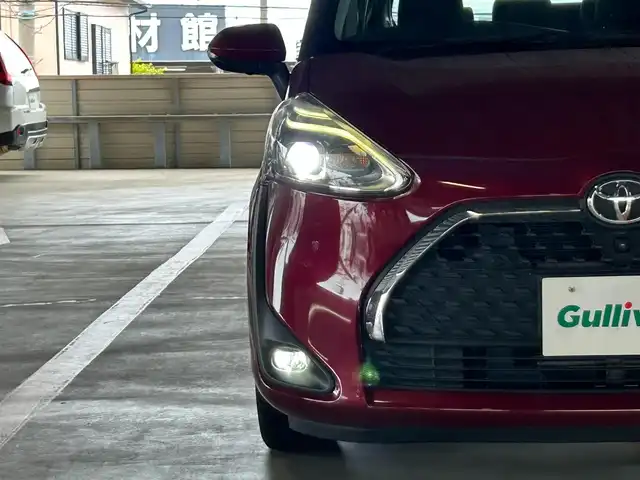 トヨタ シエンタ G クエロ 静岡県 2019(平31)年 2.3万km センシュアルレッドマイカ トヨタセーフティセンス/純正ナビ/・フルセグ/CD/DVD/Bluetooth/USB/全周囲カメラ/前方ドライブレコーダー/ビルトインETC/プリクラッシュ/両側パワースライドドア/ステアリングスイッチ/ステアリングヒーター/ハーフレザーシート/シートヒーターD/N/オートライト/スマートキー/・プッシュスタート/LEDヘッドライト/・フォグランプ/ウインカーミラー/電動格納ミラー/純正フロアマット/純正ドアバイザー